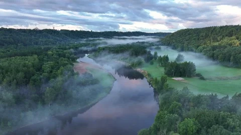 Aerial View of Misty Gauja River Valley and Forest Landscape Stock-Footage 345089911