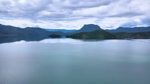 Aerial View of Misty Lake Surface in Lugu Lake Yunnan China 스톡 동영상 336894769