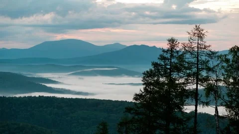 Aerial view of misty mountain landscape at sunrise 動画素材 305163840