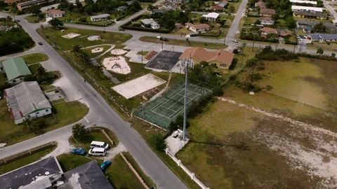 Aerial View of Mobile Cell Tower at Columbus Park, Grand Bahama, Bahamas Stock Footage 106158930