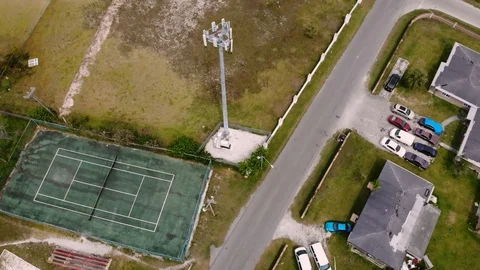 Aerial View of Mobile Cell Tower at Columbus Park, Grand Bahama, Bahamas Stock Footage 106159067