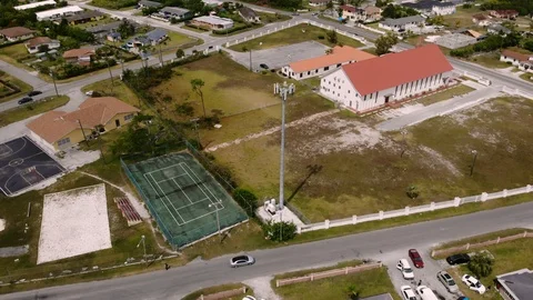 Aerial View of Mobile Cell Tower at Columbus Park, Grand Bahama, Bahamas Stock Footage 106159239