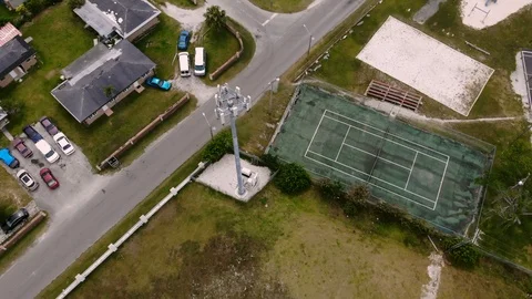 Aerial View of Mobile Cell Tower at Columbus Park, Grand Bahama, Bahamas Stock Footage 106159406