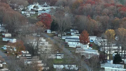 Aerial view of mobile trailer homes in american suburb district with colors Stock Footage 323196462