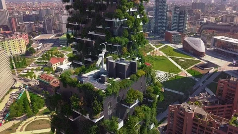 Aerial view. Modern and ecologic skyscrapers with many trees on every balcony Stock Footage 95960751