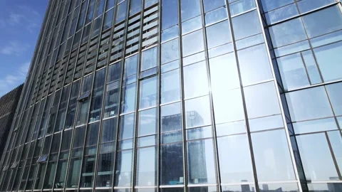Aerial view of modern architecture with full glass wall Stock Footage 165878089