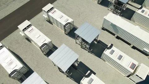 Aerial View of Modern Battery Storage Containers for Renewable Energy Stock Footage 336651990
