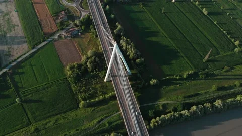 Aerial view of a modern bridge over a river in northern Italy. Stock Footage 132861049