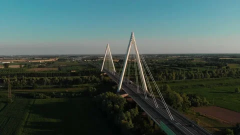 Aerial view of a modern bridge over a river in northern Italy. Stock Footage 132861648