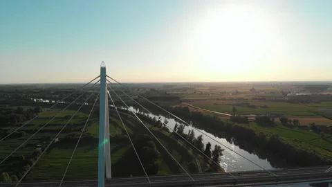 Aerial view of a modern bridge over a river in northern Italy. Stock Footage 132862282