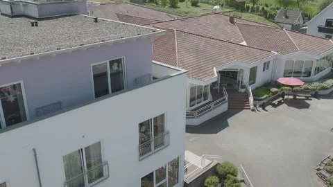 Aerial View of Modern Building Complex with Terrace, Hotel Resort, Drone Shot Видео 341520984