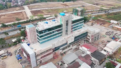 Aerial view of modern building construction in Malang, Indonesia. Stock Footage 347328384
