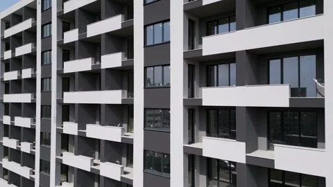 Aerial View of Modern Building Facade with Geometric Balconies 库存影片 331303630