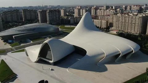 Aerial view of a modern building with unique curvilinear architecture Stock Footage 341978182