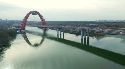 Aerial view of modern cable-stayed Zhivopisny bridge over Moskva River. Moscow Stock Footage 61950281