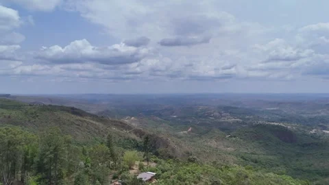 Aerial View of a Modern City Surrounded by Green Nature and Lakes Stock Footage 325593675