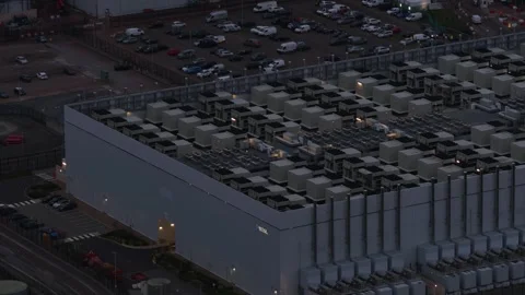 Aerial view of a modern data center building at dusk Stock Footage 333656565