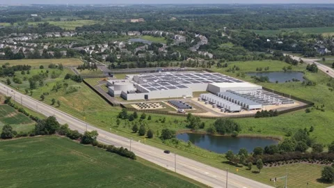 Aerial view of a modern data center facility with solar panels on the roof Stock Footage 340116074