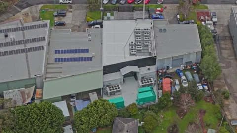 Aerial View of Modern Data Center With Rooftop Cooling Units and Solar Panels Stock Footage 342037229
