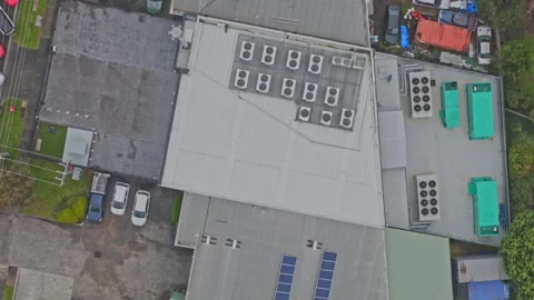 Aerial View of Modern Data Center Rooftop with Solar Panels and Cooling Units Stock Footage 342037345