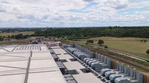 Aerial View of Modern Data Center Facility During a Bright Sunny Afternoon in Stock Footage 342077566