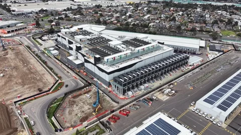 Aerial view of modern data center building and suburbs Stock Footage 342328152
