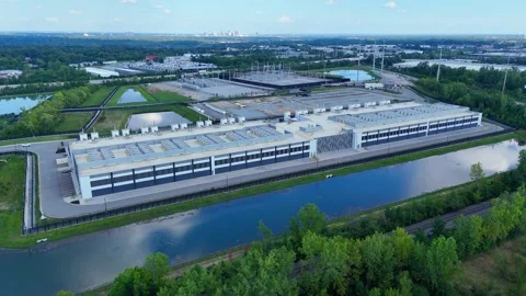 Aerial view of a modern data center building for cloud computing services in Stock Footage 345670674