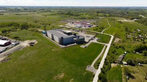 Aerial view modern data center and electrical substation in countryside Foto stock