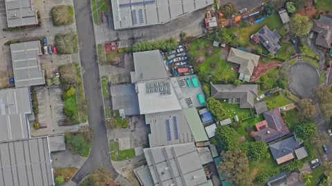 Aerial View of Modern Data Centre in Suburban Technology Park with Solar Panels Stock Footage 341491052