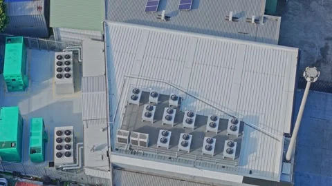 Aerial View of Modern Data Centre Rooftop with HVAC Units and Industrial Stock Footage 341501790