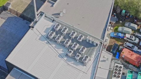 Aerial View of Modern Data Centre Rooftop Cooling Systems and Infrastructure Stock Footage 341501850