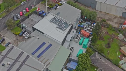 Aerial View of Modern Data Centre Rooftop with Solar Panels and Cooling Systems Stock Footage 341502035