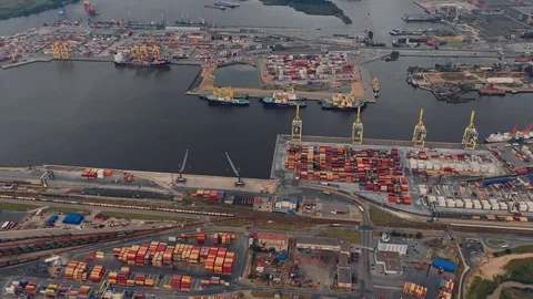 Aerial view of a modern high-tech developed port accepts ships with goods Stock Footage 113190886
