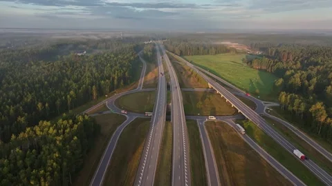 Aerial View of Modern Highway Interchange Through Forest Video stock 344596900