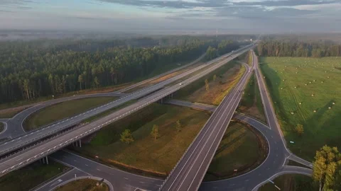 Aerial View of Modern Highway Interchange and Bridges in Rural Landscape Video stock 344596993