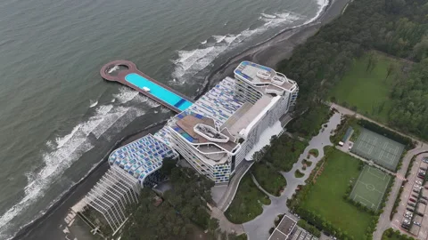 Aerial view of Modern hotel Paragraph with a huge swimming pool 스톡 동영상 240274155