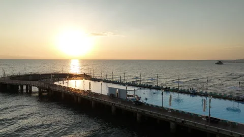 Aerial view of Modern hotel Paragraph with a huge swimming pool going to the sea 動画素材 319075489