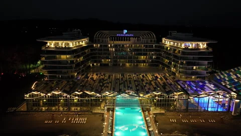 Aerial view of Modern hotel Paragraph with a huge swimming pool going to the sea 動画素材 319078005