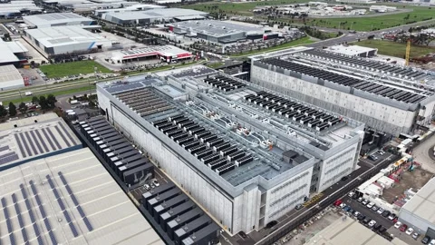 Aerial view of a modern hyperscale data center building Stock Footage 337810410