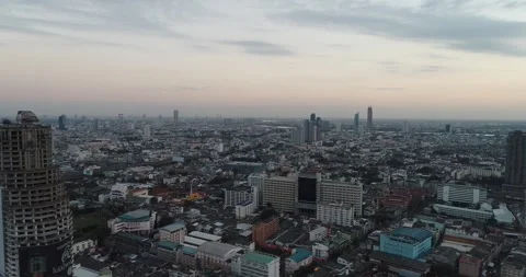 Aerial view modern office building with riverside transport road sunset sky Stock Footage 248338302