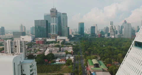 Aerial view modern office building with green Lumpini public park Silom Stock Footage 278721775