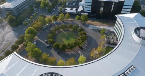 Aerial view of modern office complex with parking and landscaping. SMALES FARM, Stock Footage 302722966