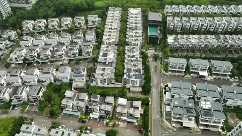 Aerial View of Modern Residential Complex with Solar Panels and Greenery Stock Footage 311575594