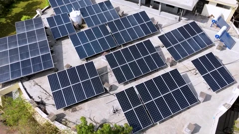 An aerial view of a modern rooftop solar power system. Stock-Footage 335618614