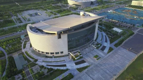 Aerial View of Modern Stadium with Unique Wavy Roof Design Video stock 337424260