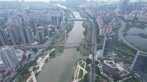 Aerial View of Modern Urban Development and River in Guangzhou Nansha District Stock Footage 342267897
