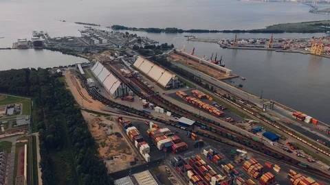 Aerial view of a modern well-equipped high-tech seaport accepts and sends cargo Stock Footage 113190894