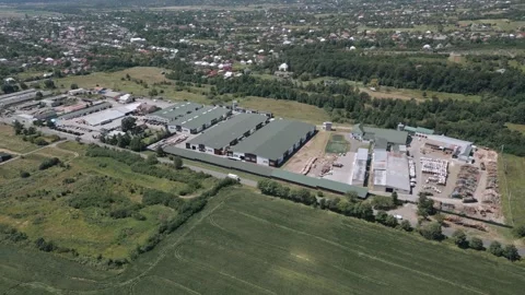 Aerial view of a modern wood processing facility in countryside Video stock 316582854