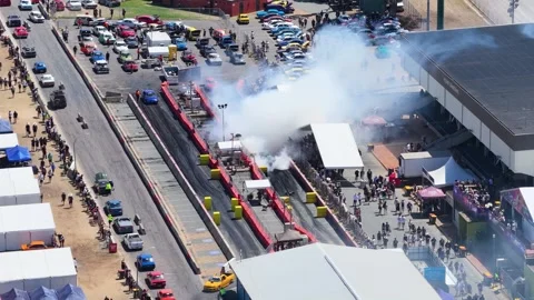 Aerial View of Modified Car Performing Burnout at Australian Festival Stock Footage 326080615