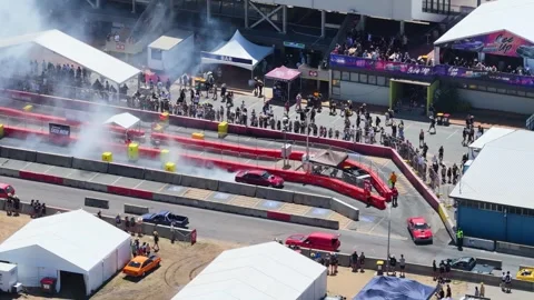 Aerial View of Modified Car Performing Burnout at Summernats Canberra Stock Footage 327710286